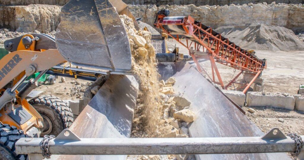 Heavy machinery performing mobile crushing, efficiently processing materials on-site, demonstrating the power and convenience of mobile crushing services.